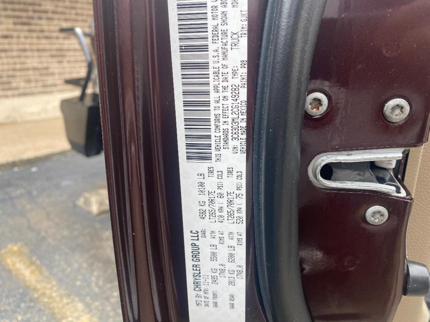 2012 Maroon /Tan Dodge Ram 3500 Laramie Mega Cab 4WD (3C63D3ML2CG) with an 6.7L L6 OHV 24V TURBO DIESEL engine, 6-Speed Automatic transmission, located at 1687 Business 35 S, New Braunfels, TX, 78130, (830) 625-7159, 29.655487, -98.051491 - Photo#23