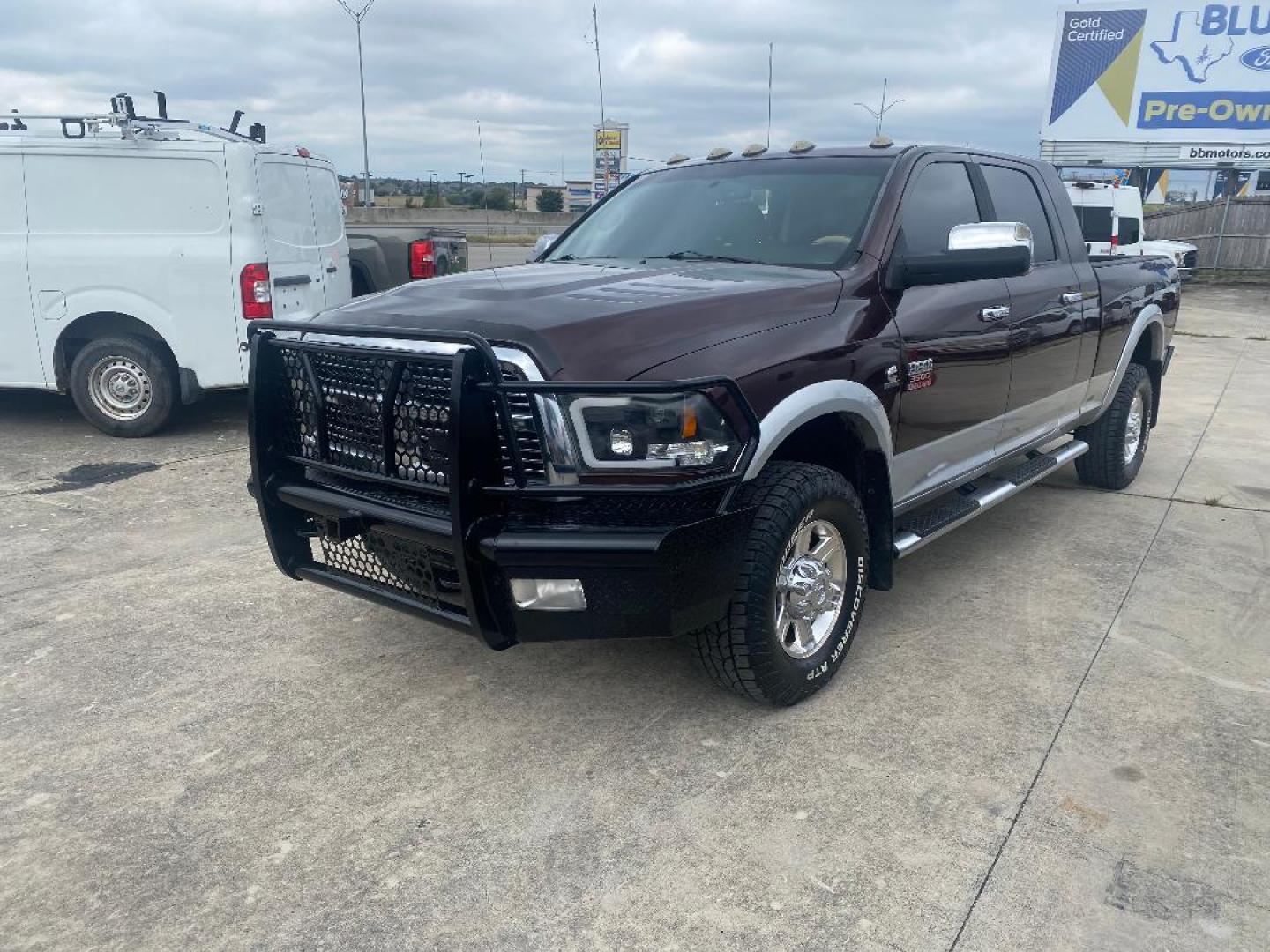 2012 Maroon /Tan Dodge Ram 3500 Laramie Mega Cab 4WD (3C63D3ML2CG) with an 6.7L L6 OHV 24V TURBO DIESEL engine, 6-Speed Automatic transmission, located at 1687 Business 35 S, New Braunfels, TX, 78130, (830) 625-7159, 29.655487, -98.051491 - Photo#0