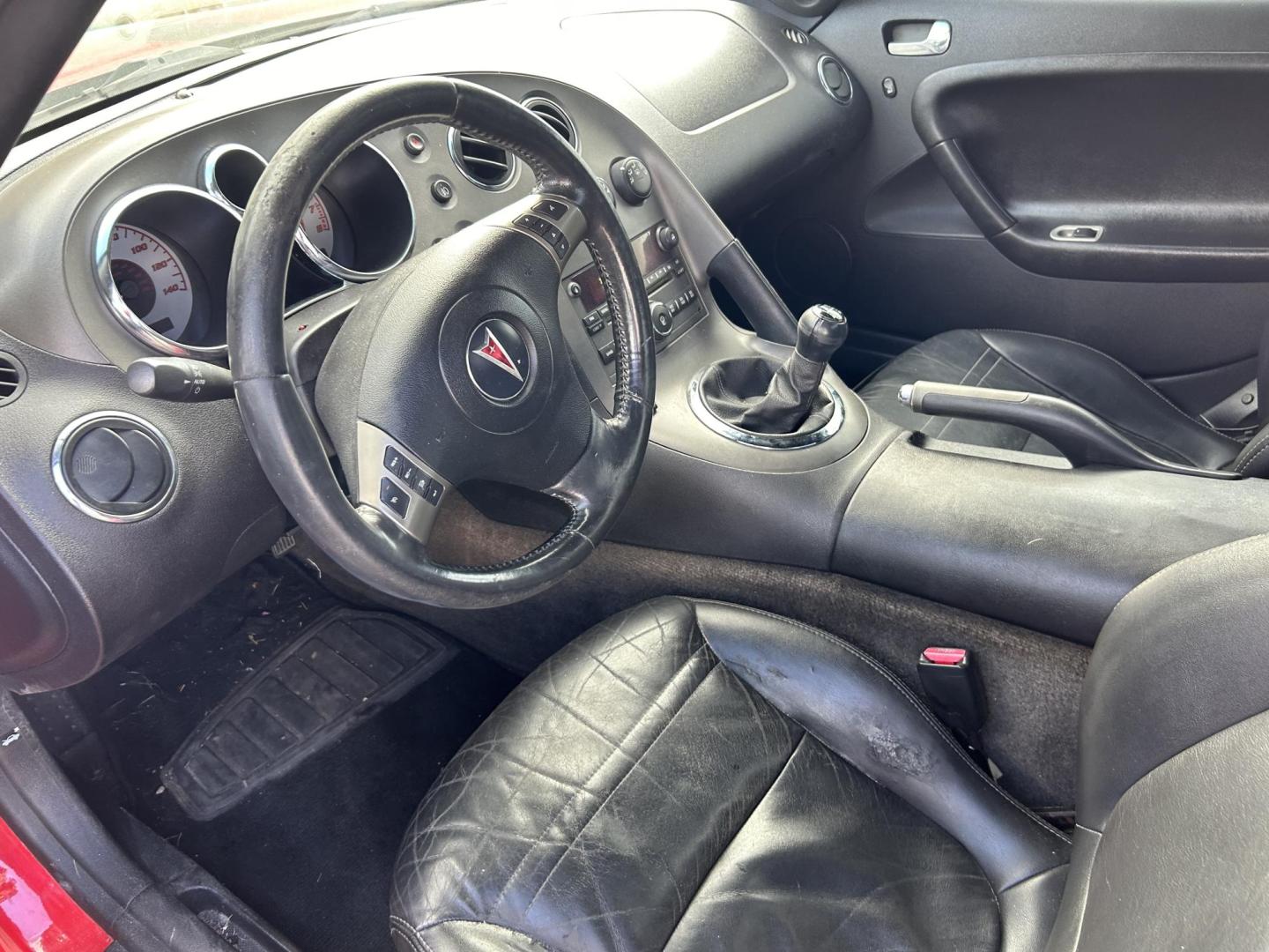 2007 Red Pontiac Solstice Base (1G2MB35B67Y) with an 2.4L L4 DOHC 16V engine, located at 1687 Business 35 S, New Braunfels, TX, 78130, (830) 625-7159, 29.655487, -98.051491 - Photo#4