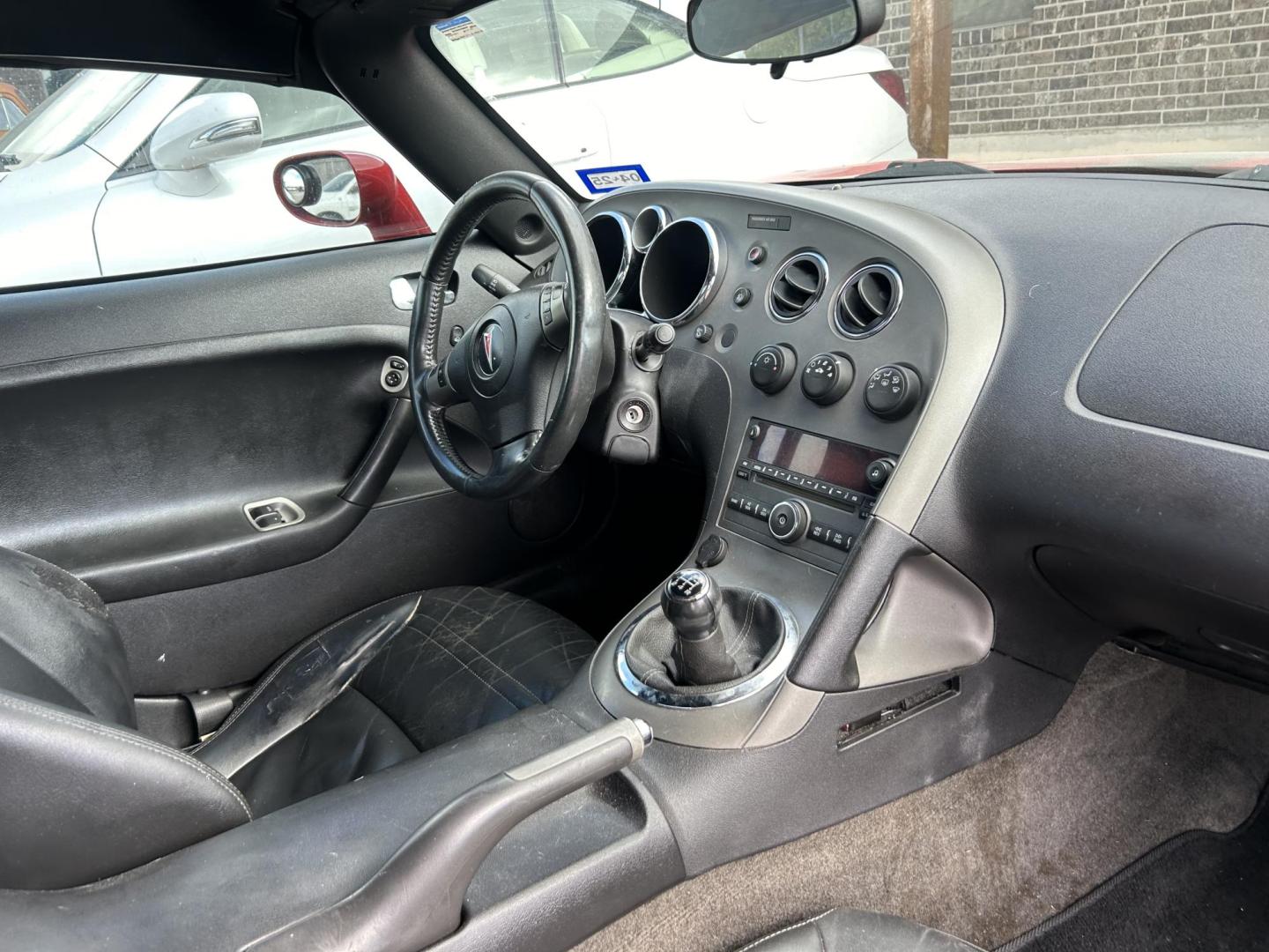 2007 Red Pontiac Solstice Base (1G2MB35B67Y) with an 2.4L L4 DOHC 16V engine, located at 1687 Business 35 S, New Braunfels, TX, 78130, (830) 625-7159, 29.655487, -98.051491 - Photo#7