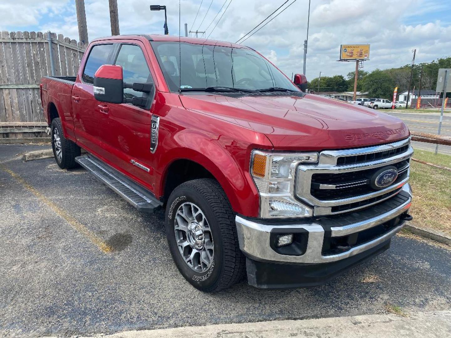 2021 Red Ford F-250 SD Lariat Crew Cab 4WD (1FT7W2BT3ME) with an 6.7L V8 OHV 16V DIESEL engine, 6A transmission, located at 1687 Business 35 S, New Braunfels, TX, 78130, (830) 625-7159, 29.655487, -98.051491 - Photo#3