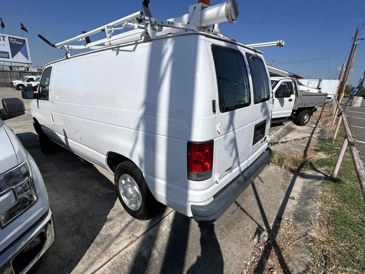 2014 White Ford E-Series Van E-150 (1FTNE1EW7ED) with an 4.6L V8 SOHC 16V engine, 4-Speed Automatic transmission, located at 1687 Business 35 S, New Braunfels, TX, 78130, (830) 625-7159, 29.655487, -98.051491 - Photo#1