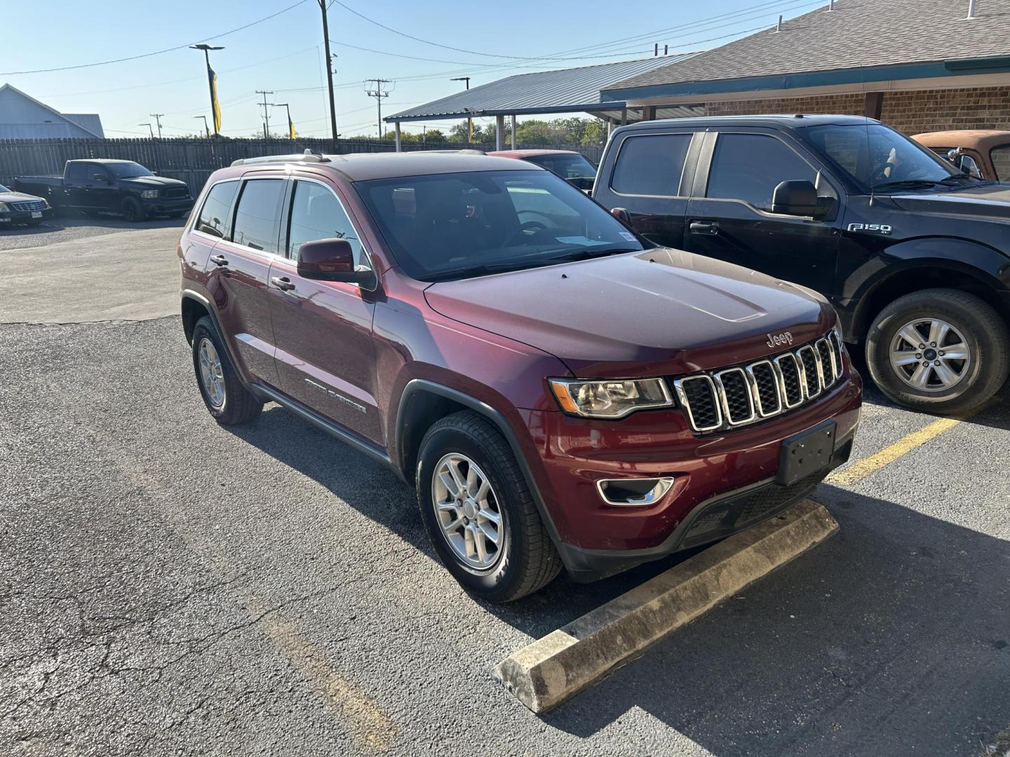 2018 Red Jeep Grand Cherokee Laredo 2WD (1C4RJEAG6JC) with an 3.6L V6 DOHC 24V engine, 8A transmission, located at 1687 Business 35 S, New Braunfels, TX, 78130, (830) 625-7159, 29.655487, -98.051491 - Photo#1