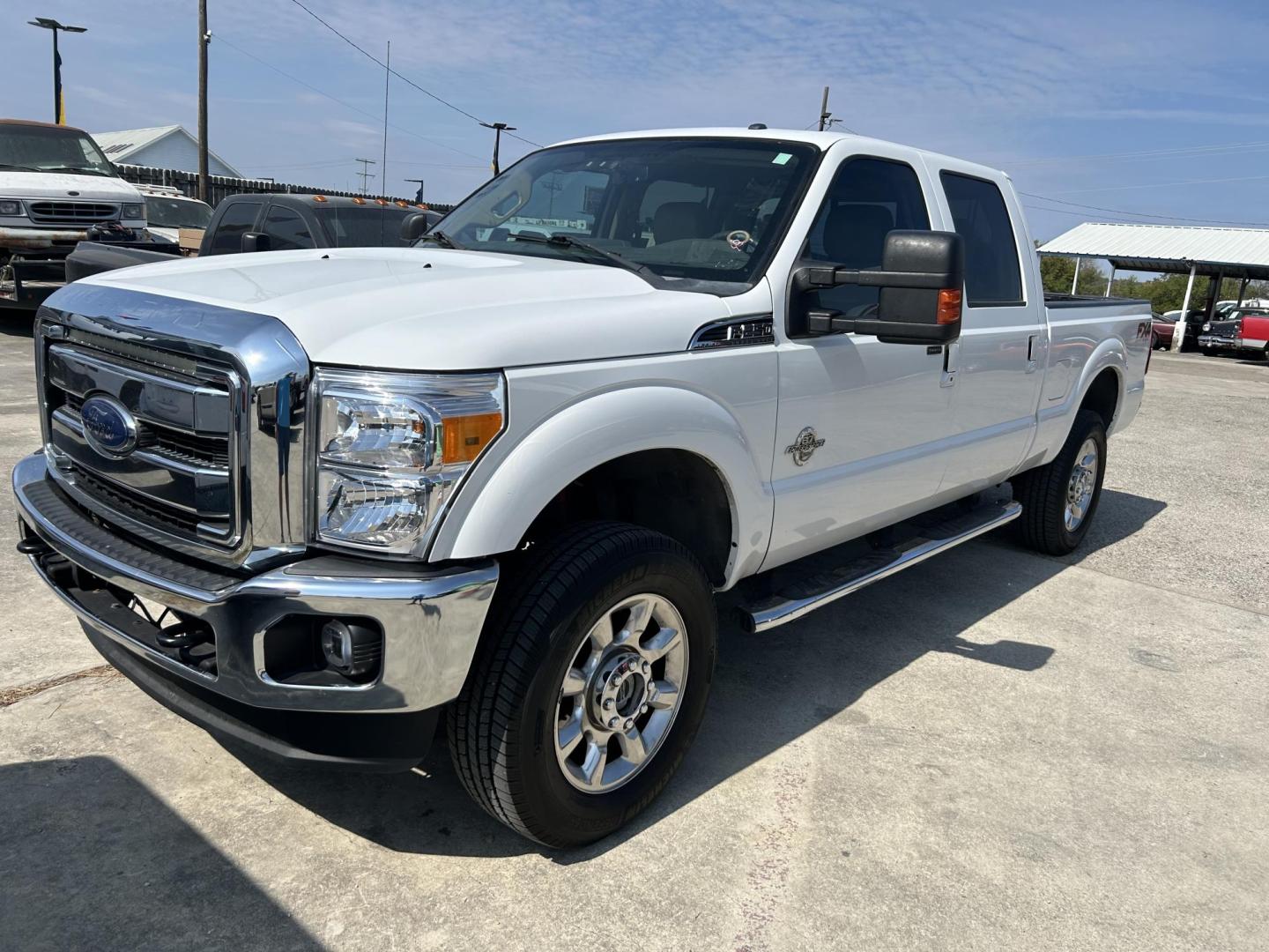 2015 White Ford F-250 SD King Ranch Crew Cab 4WD (1FT7W2BT6FE) with an 6.7L V8 OHV 16V DIESEL engine, 6-Speed Automatic transmission, located at 1687 Business 35 S, New Braunfels, TX, 78130, (830) 625-7159, 29.655487, -98.051491 - Photo#0