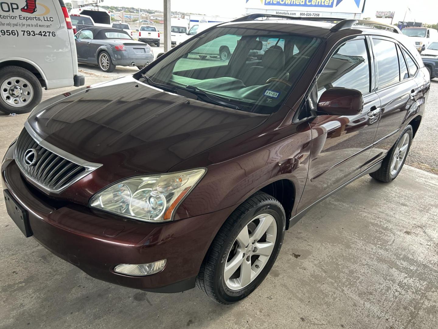 2008 Red Lexus RX 350 FWD (JTJGK31U580) with an 3.5L V6 DOHC 24V engine, 5-Speed Automatic Overdrive transmission, located at 1687 Business 35 S, New Braunfels, TX, 78130, (830) 625-7159, 29.655487, -98.051491 - Photo#0