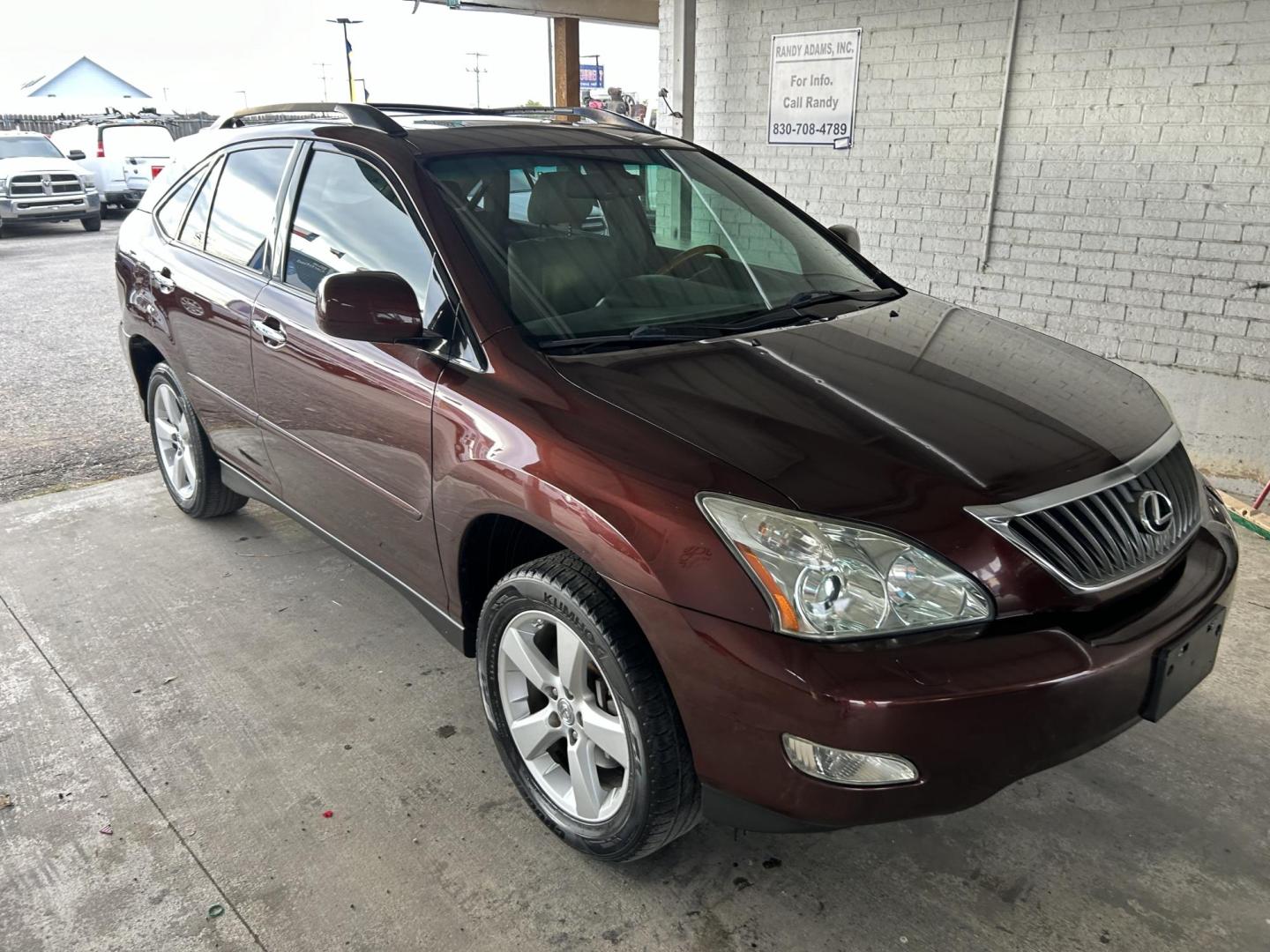 2008 Red Lexus RX 350 FWD (JTJGK31U580) with an 3.5L V6 DOHC 24V engine, 5-Speed Automatic Overdrive transmission, located at 1687 Business 35 S, New Braunfels, TX, 78130, (830) 625-7159, 29.655487, -98.051491 - Photo#3