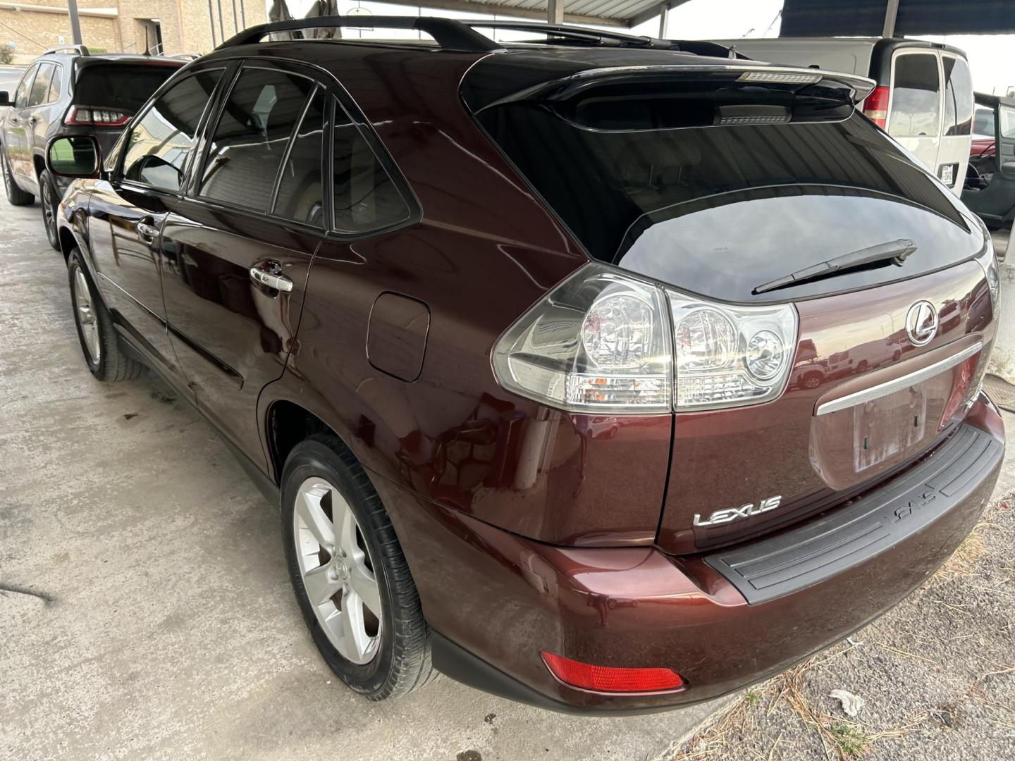 2008 Red Lexus RX 350 FWD (JTJGK31U580) with an 3.5L V6 DOHC 24V engine, 5-Speed Automatic Overdrive transmission, located at 1687 Business 35 S, New Braunfels, TX, 78130, (830) 625-7159, 29.655487, -98.051491 - Photo#1