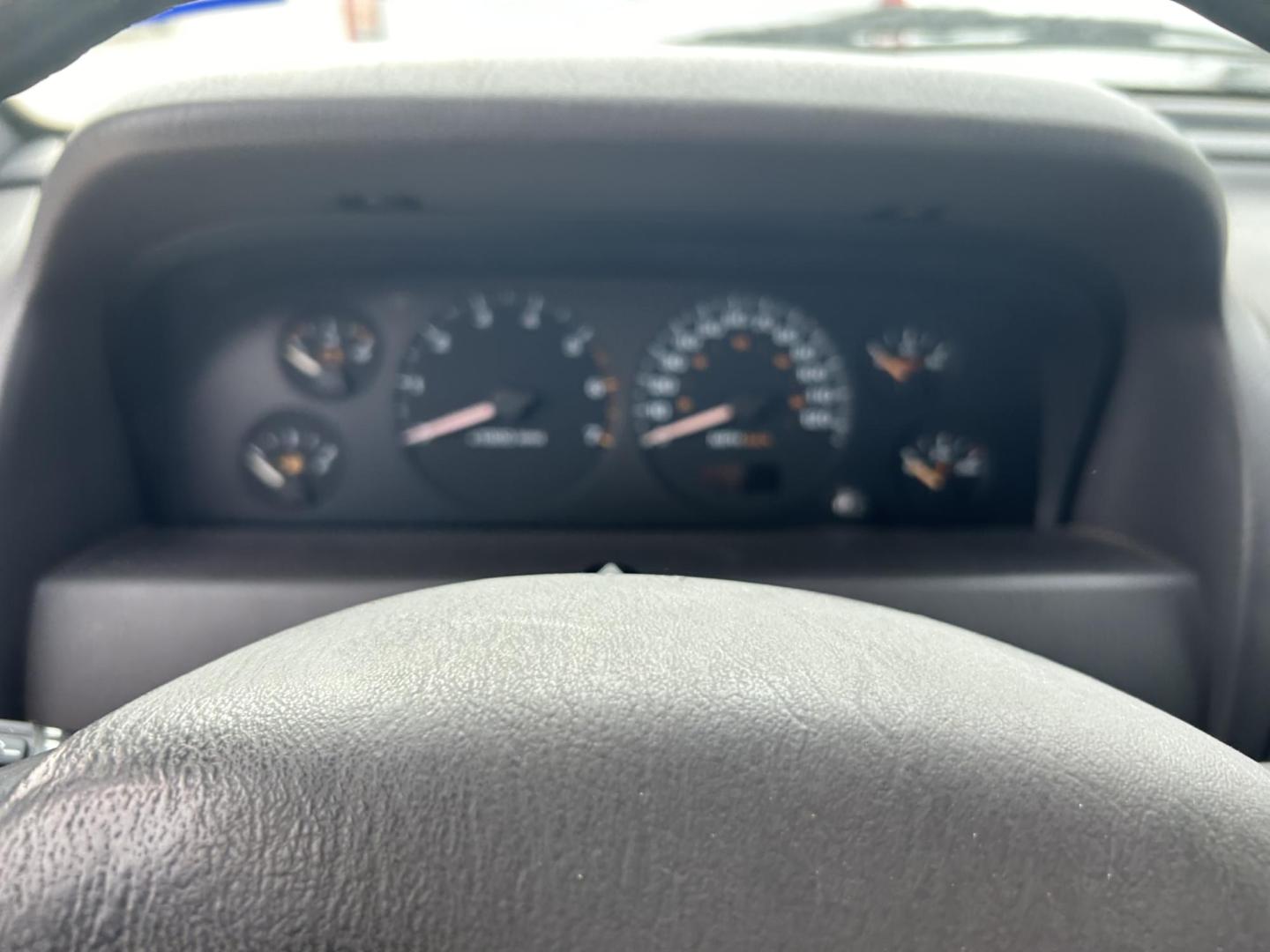 1999 Black Jeep Grand Cherokee Limited 4WD (1J4GW68NXXC) with an 4.7L V8 SOHC 16V engine, 4-Speed Automatic Overdrive transmission, located at 1687 Business 35 S, New Braunfels, TX, 78130, (830) 625-7159, 29.655487, -98.051491 - Photo#10