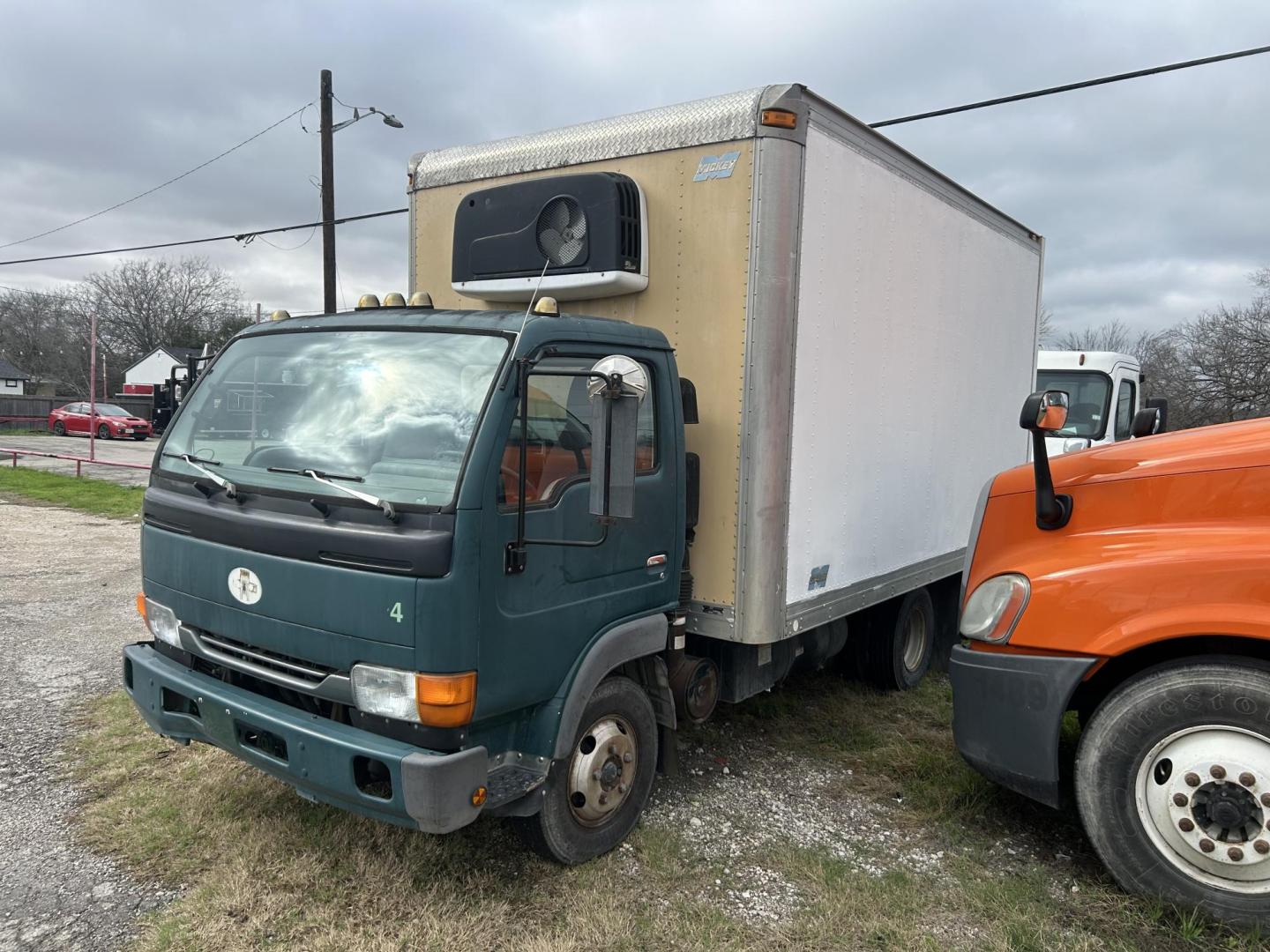 2000 Nissan UD1200 - (JNAUXV1J9YA) with an 4.6L L6 TURBO INTERCOOLER DIESEL engine, located at 1687 Business 35 S, New Braunfels, TX, 78130, (830) 625-7159, 29.655487, -98.051491 - Photo#0