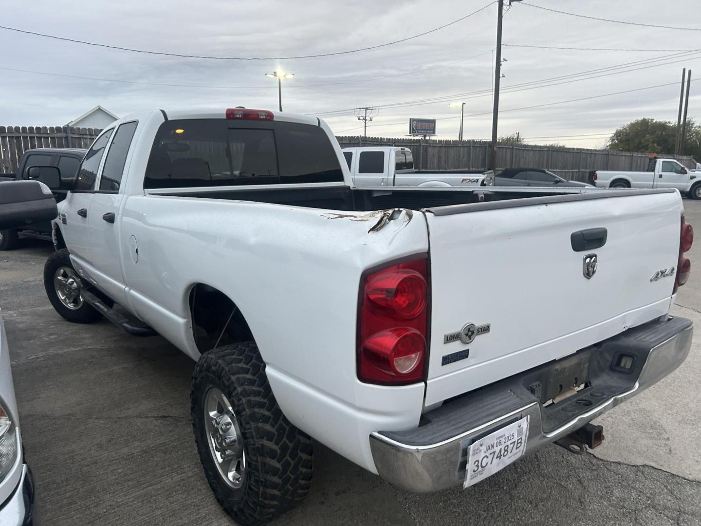 2009 White Dodge Ram 2500 Laramie Quad Cab LWB 4WD (3D7KS28L29G) with an 6.7L L6 OHV 24V TURBO DIESEL engine, located at 1687 Business 35 S, New Braunfels, TX, 78130, (830) 625-7159, 29.655487, -98.051491 - Photo#7